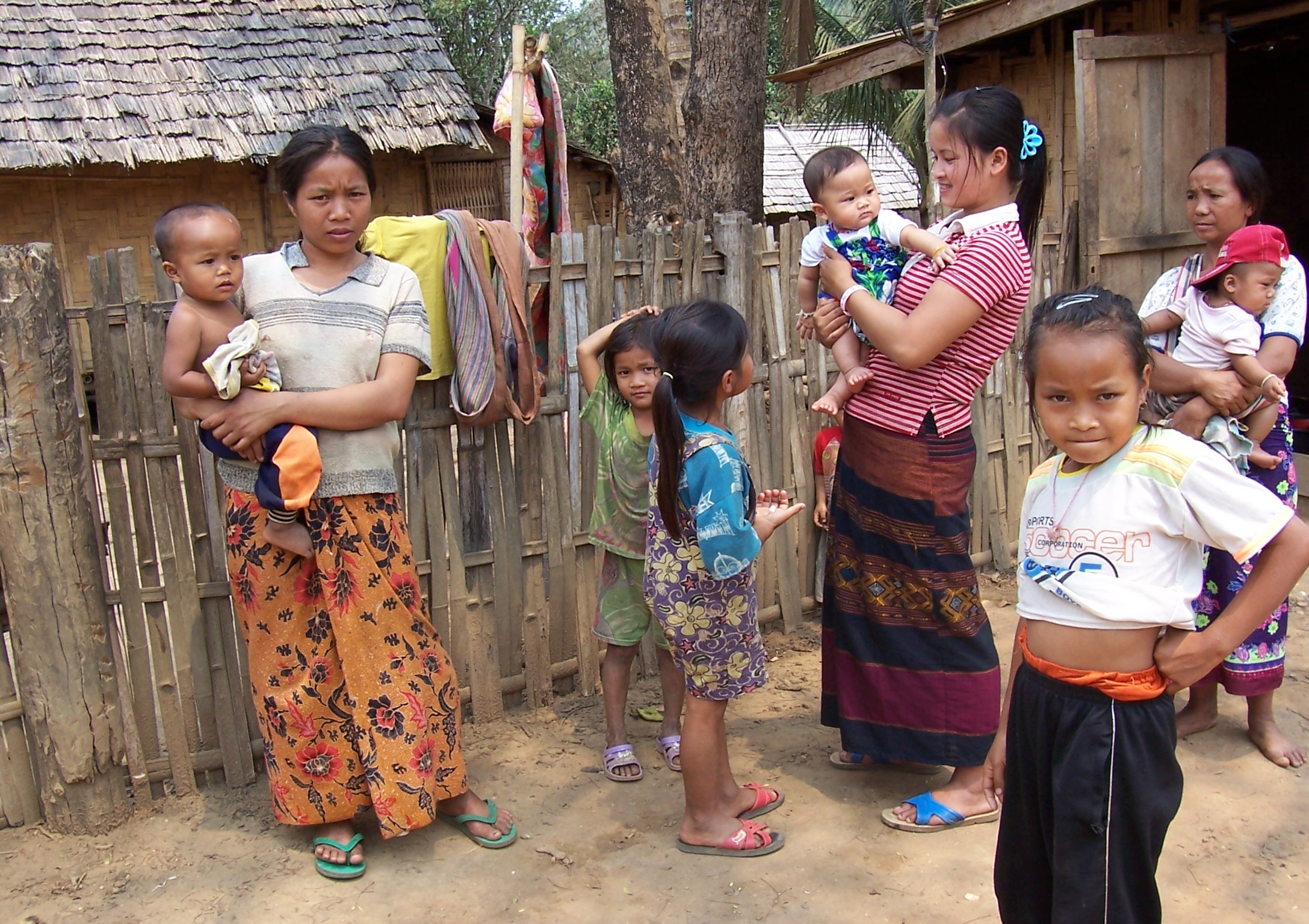 Community in a local pristine village in Laos at the banks of Mekong river