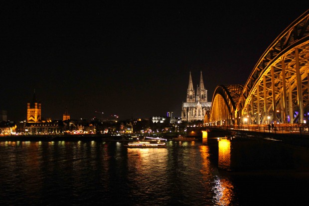 The Cologne Cathedral "Kölner Dom" with the Hohenzollern Bridge and St. Martin's church on the right