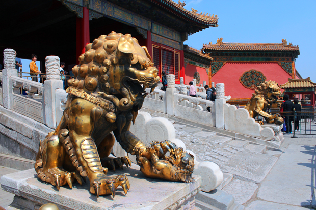 Lion statues guard the Gate of Supreme Harmony