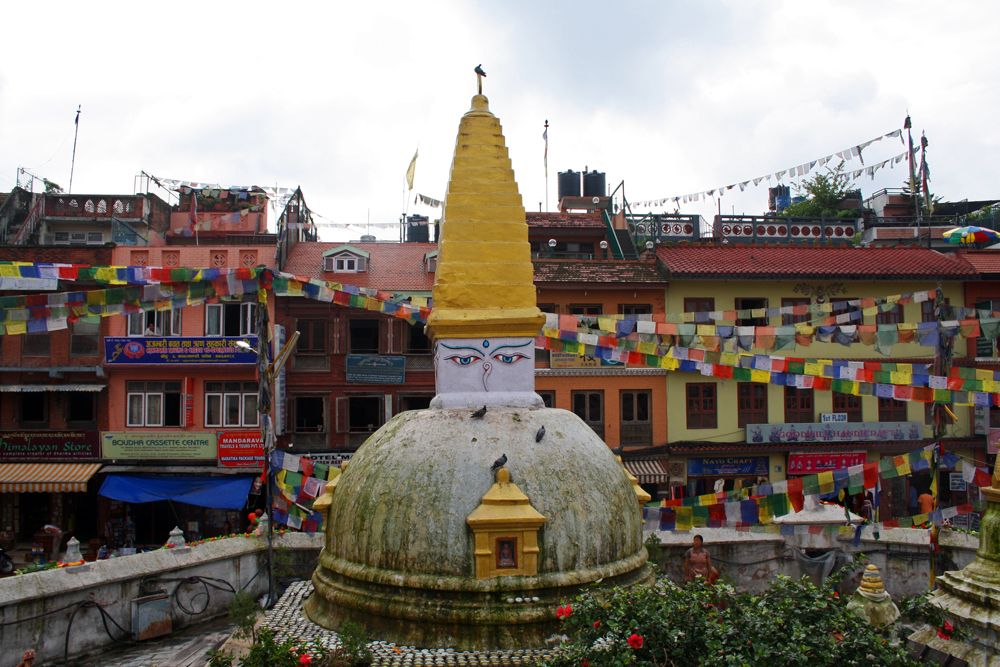 Travel bloggers tips for Bhutan - Stupa nearby the Bodnath in Kathmandu in August 2010