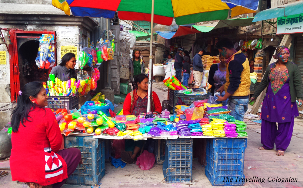 Travel blogger review 2017 Holi Festival street vendours selling colour packs Kathmandu Nepal Himalaya South Asia ASIA