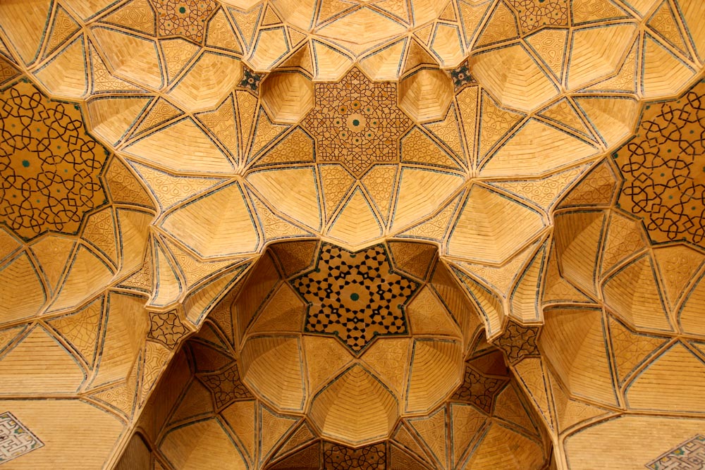 Muqarnas and ceiling decoration in the East Ivan of the Jame Mosque in Isfahan, Iran