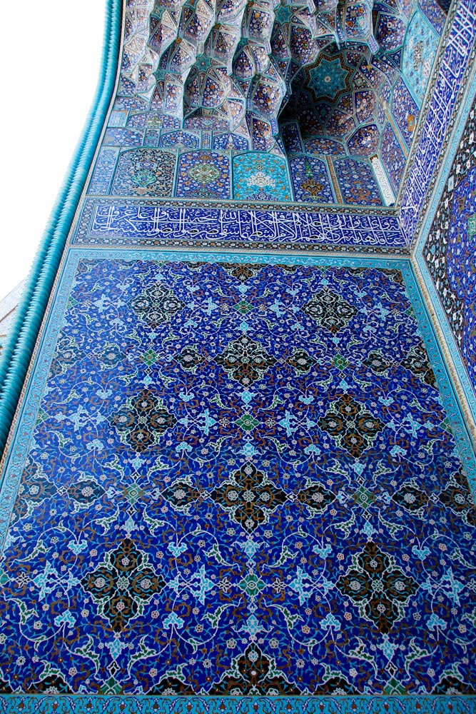 Tile decoration under the muqarnas at the entrance portal of the Shah Mosque in Isfahan, Iran