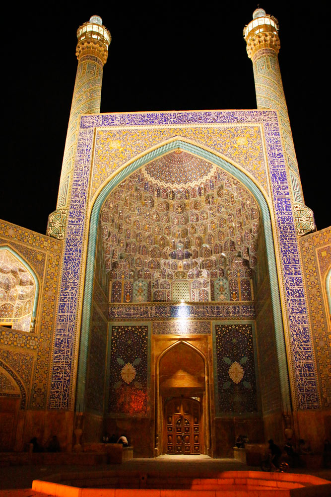 The entrance portal of the Shah Mosque in Isfahan, Iran at night